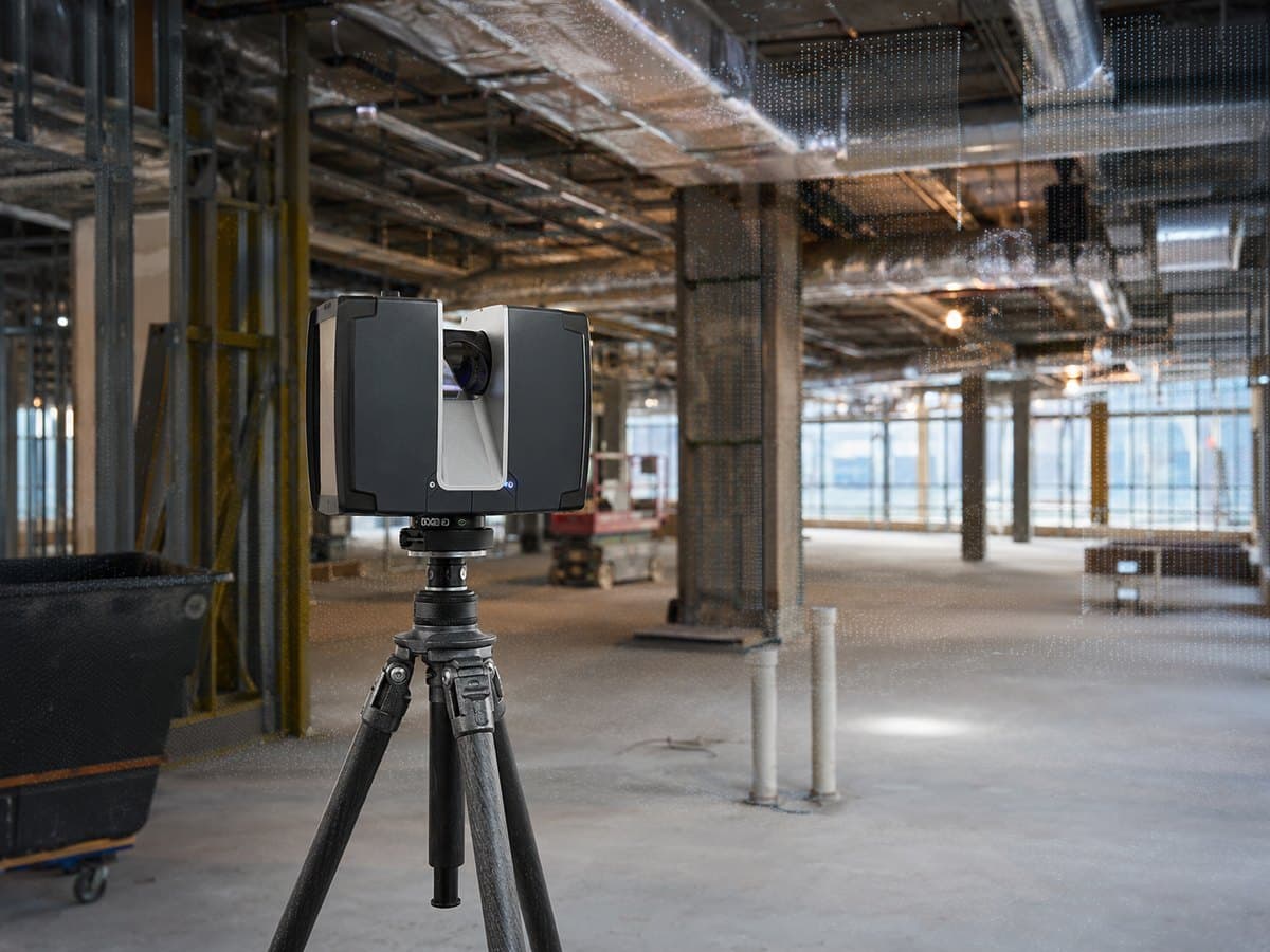 Terrestrial laser scanner on station inside a building under construction